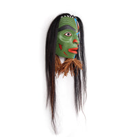Man Transforming into Bukwis - Red Cedar Mask