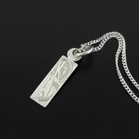 Raven and Light - Silver Pendant