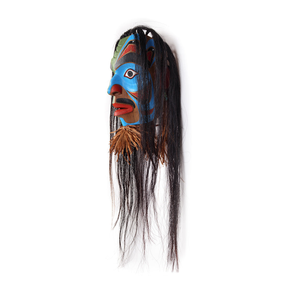 Man Transforming into Bukwis - Red Cedar Mask